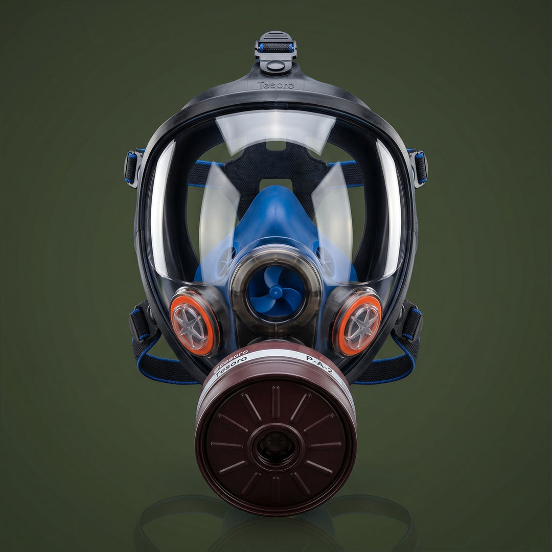 Full-face gas mask with filter on a dark green background