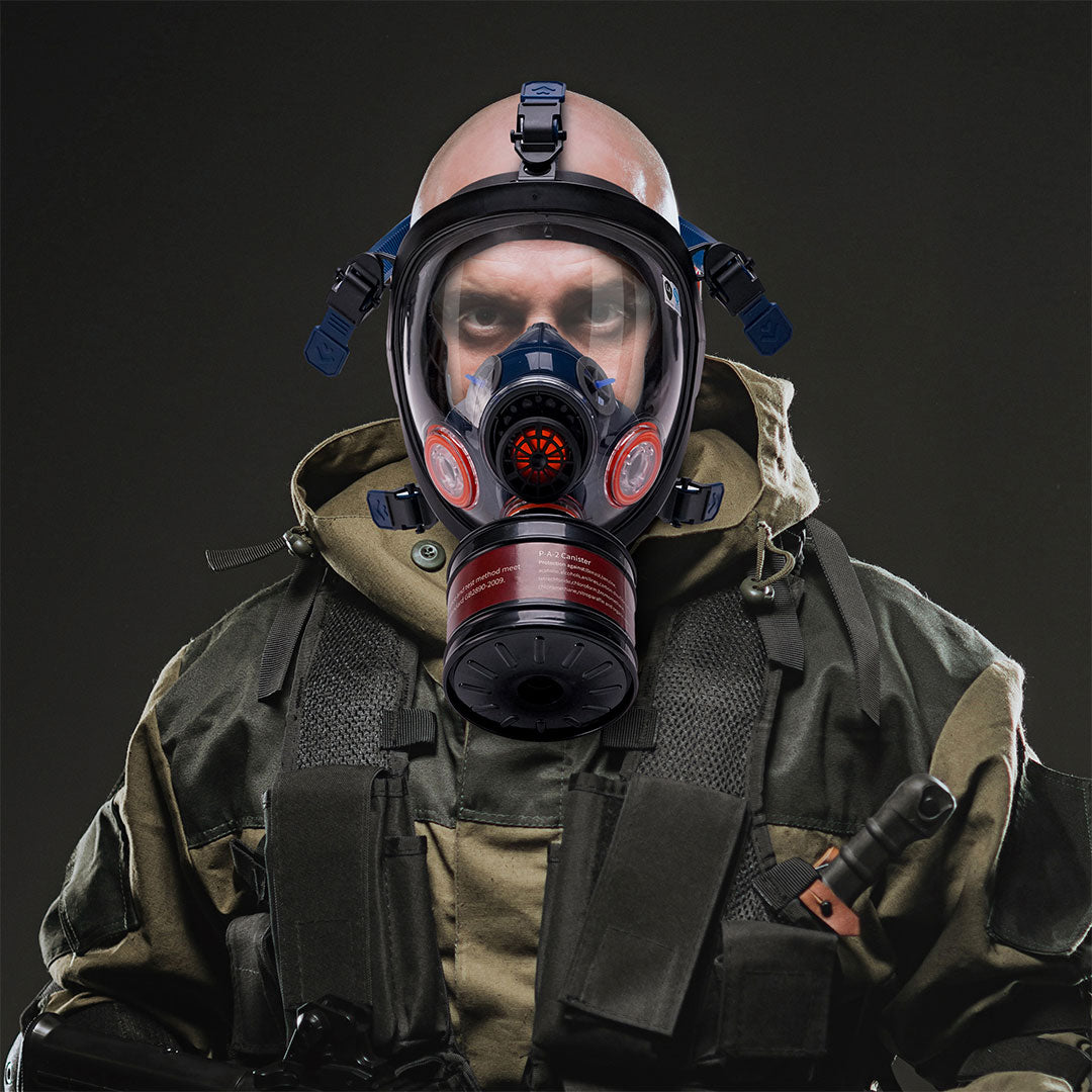Person wearing a gas mask and military uniform on a black background